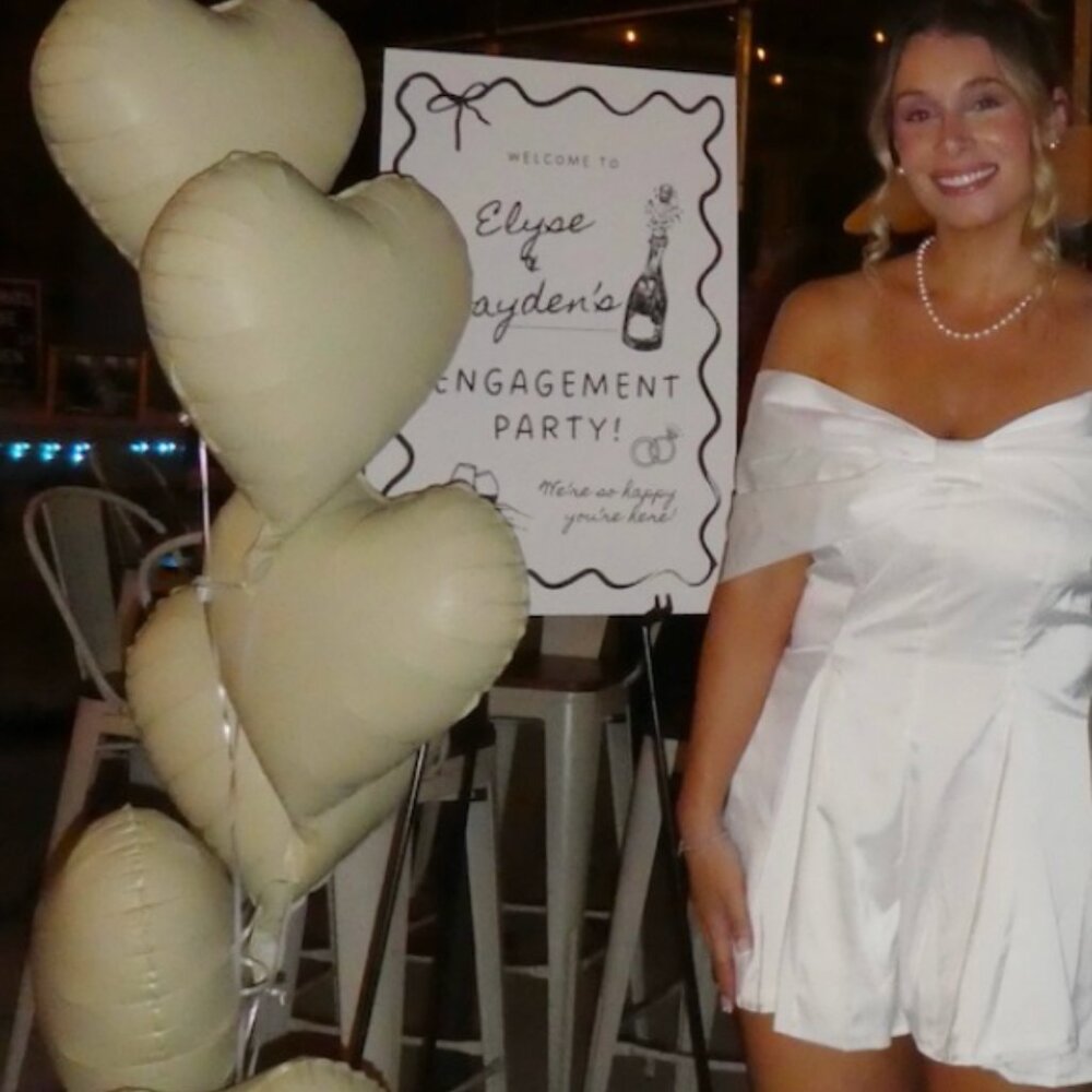 White romper with statement bow - image 1